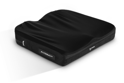 Black Axiom P cushion with a textured surface and side label for support and comfort.
