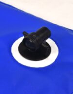Close-up of a blue inflatable object featuring a black valve on a white circular base.