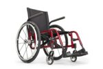 A red lightweight wheelchair with large wheels and a black seat and backrest.