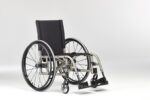 A manual wheelchair featuring a black seat and metallic frame with large wheels.