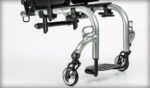 Silver mobility walker with adjustable handles and wheels for support and stability.