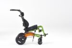 Child's wheelchair featuring a green and orange frame with adjustable seating and large rear wheels.