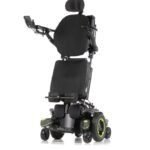 Image: Quickie standing wheelchair with sleek design and vibrant green accents, showcasing its innovative mobility features.