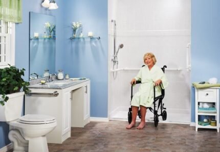 Image: a lady sits in her disability shower chair after having a great shower