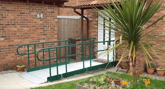 Metal Modular Ramps 12 Younique Healthcare & Mobility | Wheely Good Wheelchairs in the West Midlands | 0121 630 3850 Easiaccess Modular Metal Ramp 600 x 400 cropped Younique Healthcare & Mobility Easiaccess are a leading UK Metal Modular Ramps and step manufacturer, supplier, and fitter. We offer a nationwide supply, rental and installation service. The metal modular ramp system (including wheelchair ramps) is manufactured from galvanised steel and is simply bolted together. Installation is quick and easy, with the ramp available for immediate use. Easiramp comes with a range of amazing features as standard; such as our galvanised platforms and handrails for long lasting, complete protection against the elements. As well as trombone ends, to prevent snagging. The modular nature of each ramp means they are designed to facilitate easy dismantling and speedy reconfiguration without the need for any cutting or customisation. With recycling and reusability at the centre of our product design, considerable cost savings are achievable. Request a site visit, and you can also see it in store - get in touch today