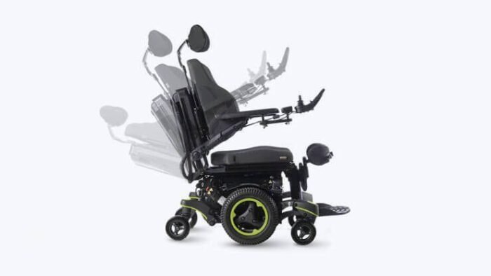 QUICKIE Q700 M SEDEO PRO ADVANCED Mid-Wheel Power Wheelchair 4 Younique Healthcare image: A powered electric wheelchairs with special anti shear mostion built in is displayed with green colour accents