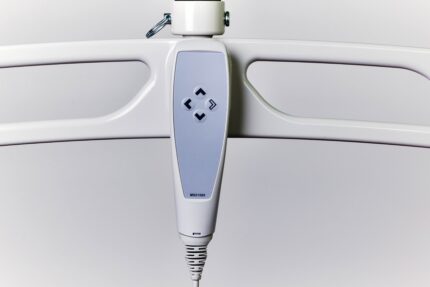M-Series essential handset with control buttons for device operation.