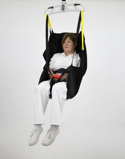 A patient lifting sling with a seated user, suspended in a neutral setting.