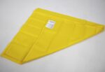 Yellow slide sheet with multiple sections and a label attached for identification.