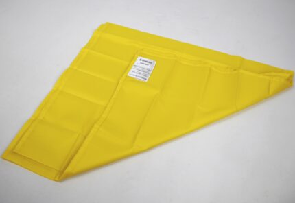 Yellow slide sheet with multiple sections and a label attached for identification.