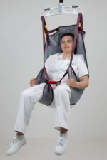 Universal deluxe sling with head support designed for patient lifting, featuring a seated design and safety straps.
