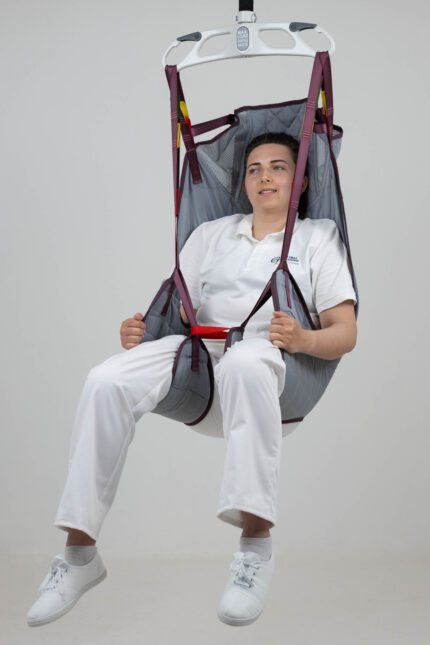 Universal deluxe sling with head support designed for patient lifting, featuring a seated design and safety straps.