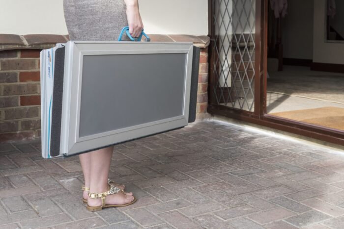 RampCentre NEW Aerolight Xtra folding suitcase ramp being carried