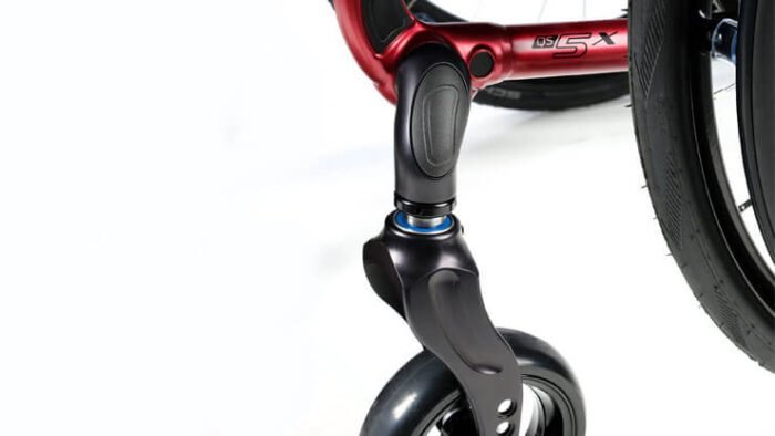 QUICKIE QS5 X 10 Younique Healthcare feature qs5x castor fork Younique Healthcare & Mobility QUICKIE QS5 X Experience FreeFold and save over 40% energy with every fold! Introducing the QUICKIE QS5 X, the wheelchair that redefines easy folding thanks to FreeFold - an innovative cross-brace design that reduces folding forces and saves you over 40% energy with every fold! The QS5 X makes light work of lifting too, with an (optional) folding fixation that keeps your wheelchair tightly-locked to prevent any unintentional opening during transport. Weighing from just 7.3 kg (without wheels), it's the lightest aluminum box frame wheelchair too. Made from heat-treated 7000 series Aluminium, lock-out the frame and its oval-tubed 4-arm cross brace provides the ride performance to rival any rigid wheelchair. Saving not just energy, but your shoulders too.