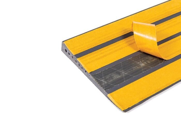 Doorline Neatslope Threshold Ramp 2 Younique Healthcare Enable Access RampCentre doorline neatslope optional self adhesive backing.jpg