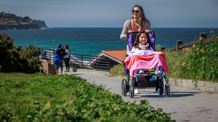 Convaid Cruiser Special Needs Buggy 5 Younique Healthcare coaster lifestyle torrance park web hero 1200x675.jpg