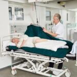 immedia 4wayglide molift air leanonme patient in bed carer 42.jpg